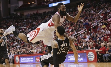 James Harden collides with Danny Green. (AP Photo/Bob Levey)