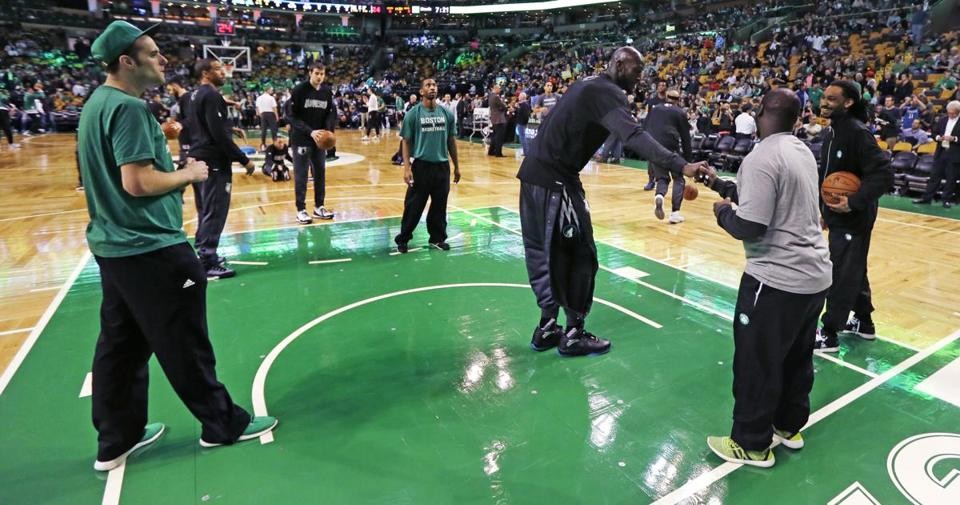AP Kevin Garnett took time to shake hands with the Celtics’ ball boys prior to Monday’s game at TD Garden.