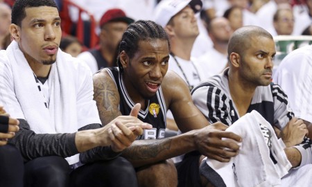 June 10, 2014 - Miami, FLORIDA, USA - San Antonio Spurs' Danny Green, Kawhi Leonard, and Tony Parker watch Game 3 of the NBA Finals against the Miami Heat from the bench Tuesday June 10, 2014 at American Airlines Arena in Miami, Fla