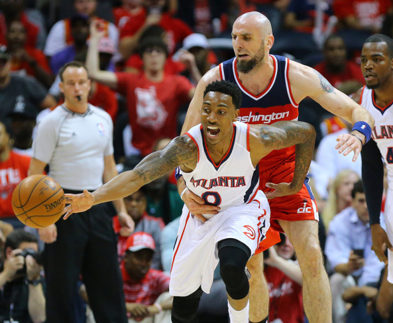 May 5, 2015 - Atlanta, GA, USA - The Atlanta Hawks' Jeff Teague (0) steals from the Washington Wizards' Marcin Gortat during Game 2 of the Eastern Conference semifinals on Tuesday, May 5, 2015, at Philips Arena in Atlanta