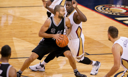 November 20, 2015:  San Antonio Spurs guard Tony Parker (9) drives against New Orleans Pelicans guard Jrue Holiday (11) during the game between San Antonio Spurs and New Orleans Pelicans at the Smoothie King Center in New Orleans, LA.  New Orleans Pelicans defeat San Antonio Spurs 104-90.  (Photograph by Stephen Lew/Icon Sportswire)