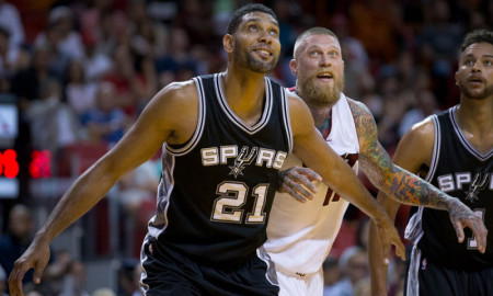 Oct. 12, 2015 - Miami, Florida, U.S. - San Antonio Spurs forward Tim Duncan (21) and Miami Heat forward Chris Andersen (11) share a laugh during a rebound at AmericanAirlines Arena in Miami, Florida on October 12, 2015 (Photo by Allen Eyestone/Zuma Press/Icon Sportswire)