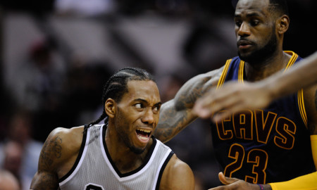 March 12, 2015 - San Antonio Spurs forward Kawhi Leonard looks to pass around the Cleveland Cavaliers' Lebron James in the first half of an NBA basketball game Thursday, March 12, 2015 in San Antonio, Texas. The Cavaliers beat the Spurs, 128-125 in overtime