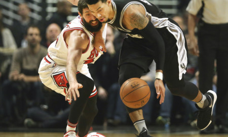 Nov. 30, 2015 - Chicago, IL, USA - San Antonio Spurs guard Danny Green (14) steals the ball from Chicago Bulls forward Nikola Mirotic (44) during the first half on Monday, Nov. 30, 2015, at the United Center in Chicago (Photo by Nuccio Dinuzzo/Zuma Press/Icon Sportswire)