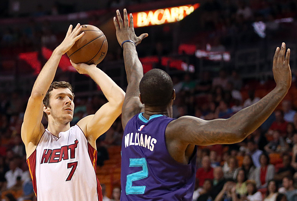 April 7, 2015 - Miami, FL, USA - The Miami Heat's Goran Dragic (7) shoots against the Charlotte Hornets' Marvin Williams (2) in the first quarter at AmericanAirlines Arena in Miami on Tuesday, April 7, 2015