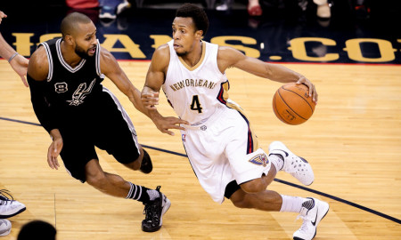 November 20, 2015: New Orleans Pelicans guard Ish Smith (4) drives against San Antonio Spurs guard Patty Mills (8) during the game between San Antonio Spurs and New Orleans Pelicans at the Smoothie King Center in New Orleans, LA. New Orleans Pelicans defeat San Antonio Spurs 104-90. (Photograph by Stephen Lew/Icon Sportswire)