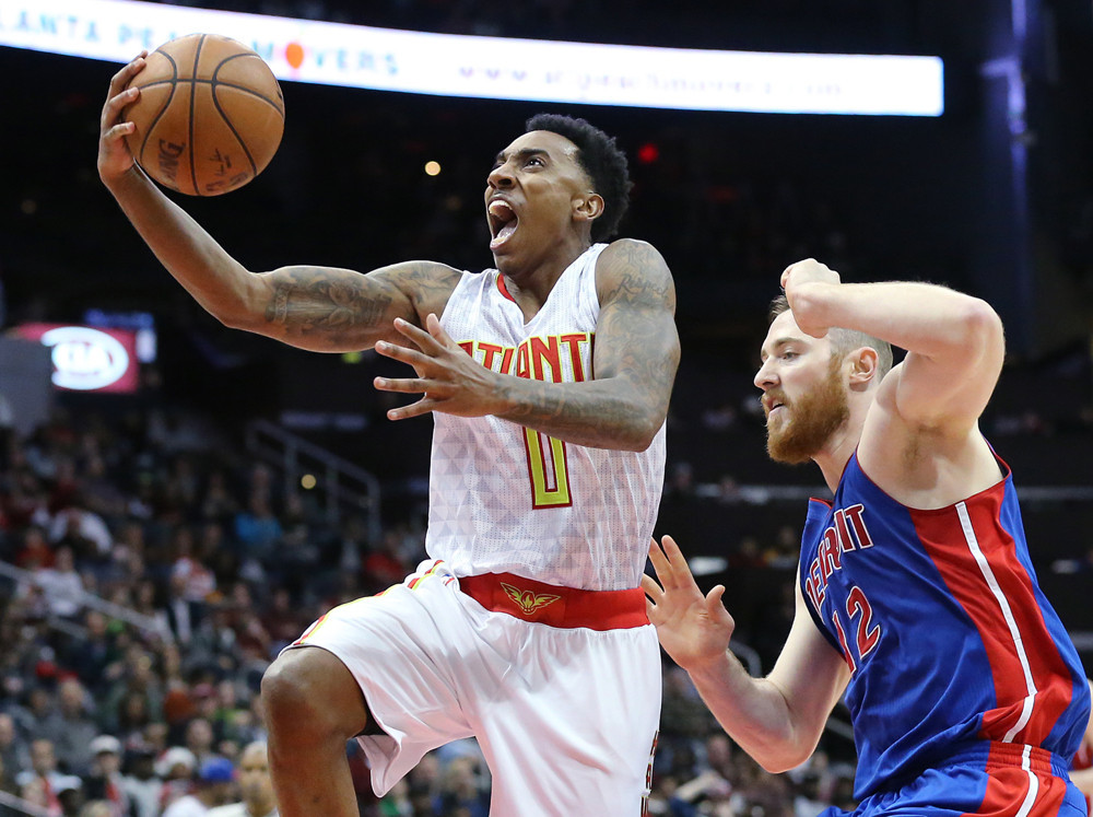 Dec. 23, 2015 - Atlanta, GA, USA - The Atlanta Hawks' Jeff Teague, left, goes to the basket past the Detroit Pistons' Aron Baynes during the first half on Wednesday, Dec. 23, 2015, at Philips Arena in Atlanta (Photo by Curtis Compton/Zuma Press/Icon Sportswire)