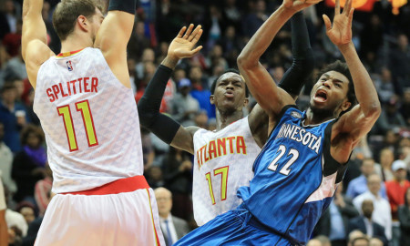 Nov. 9, 2015 - Atlanta, GA, USA - Minnesota Timberwolves' Andrew Wiggins gets off a shot on a double team by Atlanta Hawks defenders Tiago Splitter and Dennis Schroder during the second half on Monday, Nov. 9, 2015, at Philips Arena in Atlanta (Photo by Curtis Compton/Zuma Press/Icon Sportswire)