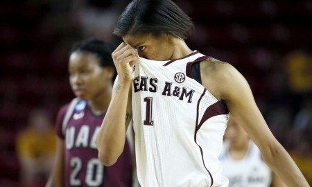 exas A&M forward Courtney Williams (1) and Arkansas Little Rock forward Shanity James (20) walk to the bench during the second half of a women's first round NCAA tournament college basketball game, Saturday, March 21, 2015, Tempe, Ariz. Arkansas Little Rock won 69-60. (AP Photo/Matt York)