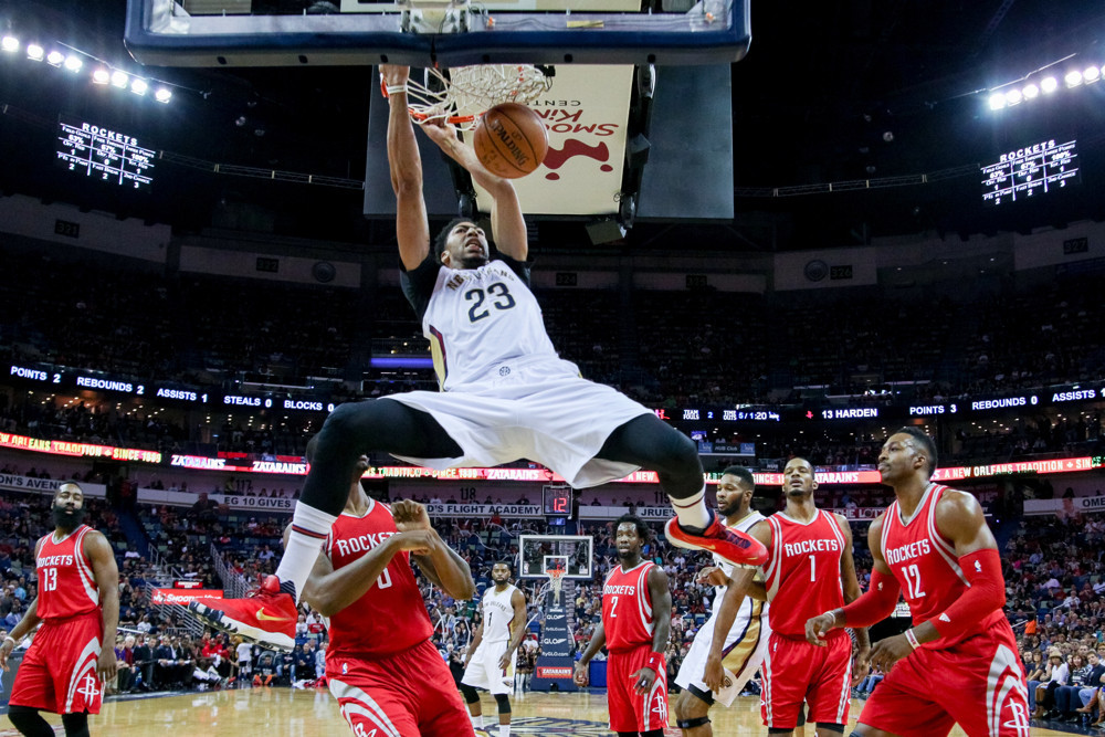 December 26, 2015: New Orleans Pelicans forward Anthony Davis (23) dunks the ball during the game between the New Orleans Pelicans and the Houston Rockets at the Smoothie King Center in New Orleans, LA. (Photograph by Stephen Lew/Icon Sportswire)