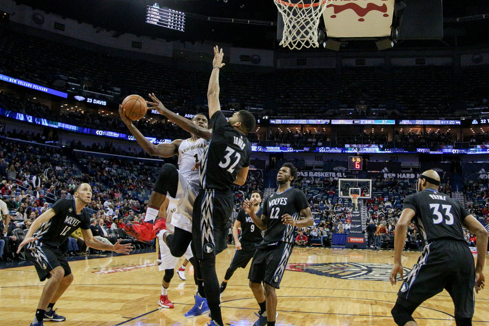 January 19, 2016: New Orleans Pelicans guard Tyreke Evans (1) drives to the basket against Minnesota Timberwolves center Karl-Anthony Towns (32) during the NBA game between the Minnesota Timberwolves and the New Orleans Pelicans at the Smoothie King Center in New Orleans, LA. New Orleans Pelicans defeat Minnesota Timberwolves 114-99. (Photograph by Stephen Lew/Icon Sportswire)