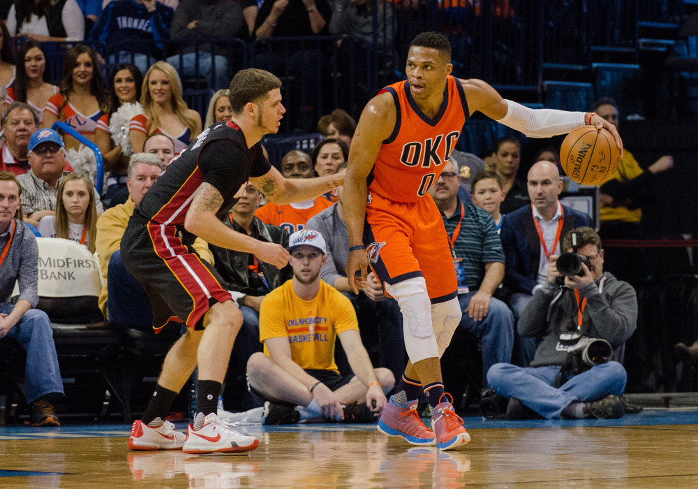 January 17, 2016 Oklahoma City Thunder Guard Russell Westbrook (0) looks for a play while being guarded by Miami Heat Guard Tyler Johnson (8) at the Chesapeake Energy Arena in Oklahoma City (Torrey Purvey/Icon Sportswire)