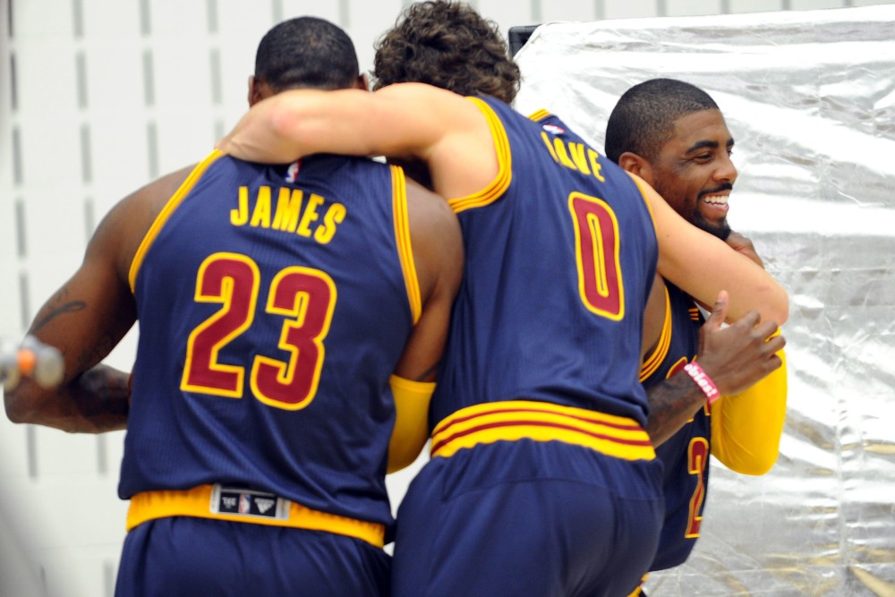 Sep 28, 2015; Cleveland, OH, USA; Cleveland Cavaliers forward LeBron James (23), Cleveland Cavaliers forward Kevin Love (0) and Cleveland Cavaliers guard Kyrie Irving (2) during Cleveland Cavaliers media day at Cleveland Clinic Courts. Mandatory Credit: Ken Blaze-USA TODAY Sports
