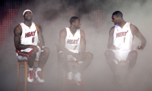 09 JULY 2010: Miami Heat Dwayne Wade (C),Chris Bosh (R) and LeBron James celebrate during Miami Heat's 'HEAT Summer of 2010 Welcome Event' at the American Airlines arena in Miami, Florida. The Miami Heat reached an agreement with LeBron James to leave the Cleveland Cavaliers, and sign with the Miami Heat.