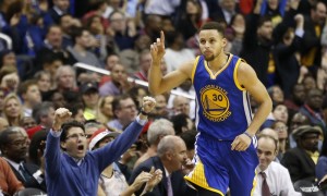 Feb 3, 2016; Washington, DC, USA; Golden State Warriors guard Stephen Curry (30) gestures after making a three point field goal against the Washington Wizards in the fourth quarter at Verizon Center. The Warriors won 134-121. Mandatory Credit: Geoff Burke-USA TODAY Sports