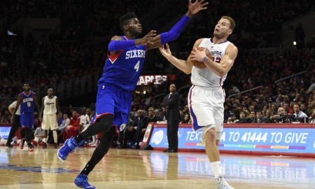 Jan 3, 2015; Los Angeles, CA, USA; Los Angeles Clippers forward Blake Griffin (32) grabs an inbound pass defended by Philadelphia 76ers forward Nerlens Noel (4) during the third quarter at Staples Center. The Los Angeles Clippers won 127-91. Mandatory Credit: Kelvin Kuo-USA TODAY Sports