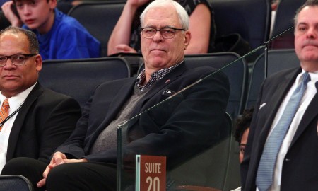 Dec 21, 2015; New York, NY, USA; New York Knicks general manager Phil Jackson watches during the third quarter against the Orlando Magic at Madison Square Garden. The Magic defeated the Knicks 107-99. Mandatory Credit: Brad Penner-USA TODAY Sports