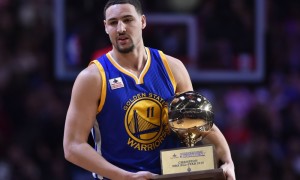 Feb 13, 2016; Toronto, Ontario, Canada; Golden State Warriors guard Klay Thompson celebrates with the trophy after winning the three-point contest during the NBA All Star Saturday Night at Air Canada Centre. Mandatory Credit: Bob Donnan-USA TODAY Sports