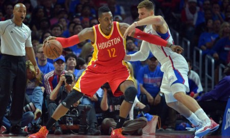 May 10, 2015; Los Angeles, CA, USA; Houston Rockets center Dwight Howard (12) is defended by Los Angeles Clippers forward Blake Griffin (32) in game three of the second round of the NBA Playoffs at Staples Center. The Clippers defeated the Rockets 128-95 to take a 3-1 lead. Mandatory Credit: Kirby Lee-USA TODAY Sports
