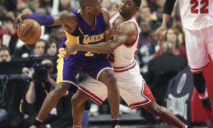 Feb. 21, 2016 - Chicago, IL, USA - Los Angeles Lakers forward Kobe Bryant (24) keeps the ball away from Chicago Bulls guard E'Twaun Moore (55) during the first half on Sunday, Feb. 21, 2016, at the United Center in Chicago (Photo by Nuccio Dinuzzo/Zuma Press/Icon Sportswire)