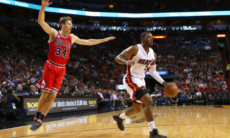 March 1, 2016 - Miami, FL, USA - Miami Heat guard Joe Johnson drives against Chicago Bulls guard Mike Dunleavy during the first quarter on Tuesday, March 1, 2016, at the AmericanAirlines Arena in Miami (Photo by David Santiago/Zuma Press/Icon Sportswire)