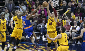 23 December 2015: New York Knicks Guard Arron Afflalo (4) passes the ball while being guarded by Cleveland Cavaliers Center Timofey Mozgov (20) during the game between the New York Knicks and the Cleveland Cavaliers at Quicken Loans Arena in Cleveland, Oh. (Photo by Mark Alberti/ Icon Sportswire)