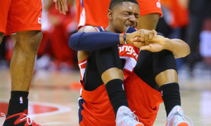 May 3, 2015 - Atlanta, GA, USA - Washington Wizards' Bradley Beal bites his jersey after he hit the floor on a play against the Atlanta Hawks and left the court in pain during Game 1 of the Eastern Conference Semifinals on Sunday, May 3, 2015, at Philips Arena in Atlanta