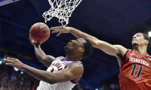February 27, 2016 - Lawrence, KS, USA - Kansas' Wayne Selden gets by Texas Tech's Zach Smith (11) for a shot during the second half at Allen Fieldhouse in Lawrence, Kan., on Saturday, Feb. 27, 2016. The host Jayhawks won, 67-58 (Photo by Rich Sugg/Zuma Press/Icon Sportswire)