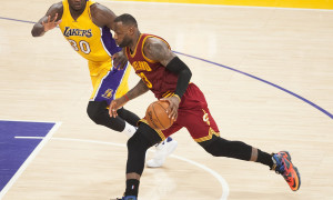 March 10, 2016 - Los Angeles, CA, USA - The Lakers' Julius Randle tries to keep up with the Cavaliers' LeBron James during their 120-108 loss to Cleveland at Staples Center in Los Angeles, California on March 10, 2016. (Photo by Kevin Sullivan/Zuma Press/Icon Sportswire)