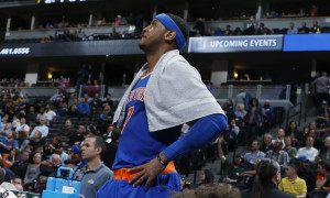 New York Knicks forward Carmelo Anthony looks on as time runs out in the second half of an NBA basketball game against the Denver Nuggets, Tuesday, March 8, 2016, in Denver. The Nuggets won 110-94. (AP Photo/David Zalubowski)