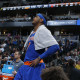 New York Knicks forward Carmelo Anthony looks on as time runs out in the second half of an NBA basketball game against the Denver Nuggets, Tuesday, March 8, 2016, in Denver. The Nuggets won 110-94. (AP Photo/David Zalubowski)