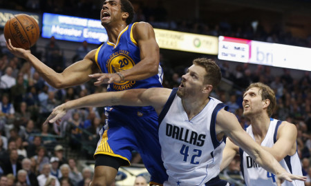 March 18, 2016 - Dallas, TX, USA - The Golden State Warriors' James Michael McAdoo (20) drives past the Dallas Mavericks' David Lee (42) during the second half on Friday, March 18, 2016, at the American Airlines Center in Dallas. The Warriors won, 130-112 (Photo by Jim Cowsert/Zuma Press/Icon Sportswire)