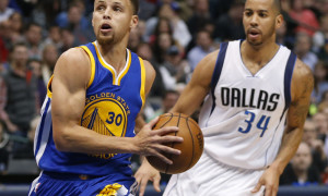 March 18, 2016 - Dallas, TX, USA - The Golden State Warriors' Stephen Curry (30) drives past the Dallas Mavericks' Devin Harris (34) during the second half on Friday, March 18, 2016, at the American Airlines Center in Dallas. The Warriors won, 130-112 (Photo by Jim Cowsert/Zuma Press/Icon Sportswire)