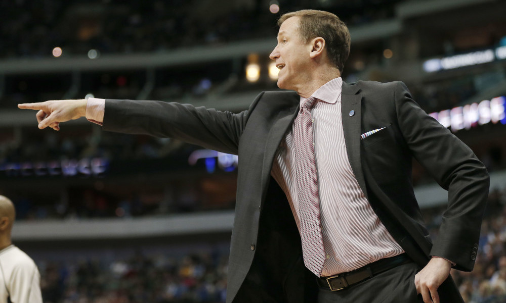 Portland Trail Blazers head coach Terry Stotts talks to his team during the first half of an NBA basketball game against the Dallas Mavericks on Sunday, March 20, 2016, in Dallas. Dallas won in overtime 132-120. (AP Photo/Brandon Wade)