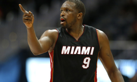 Miami Heat forward Luol Deng reacts late in the second half of the team's NBA basketball game against the Atlanta Hawks on Friday, Feb. 19, 2016, in Atlanta. The Heat won 115-111. (AP Photo/Todd Kirkland)