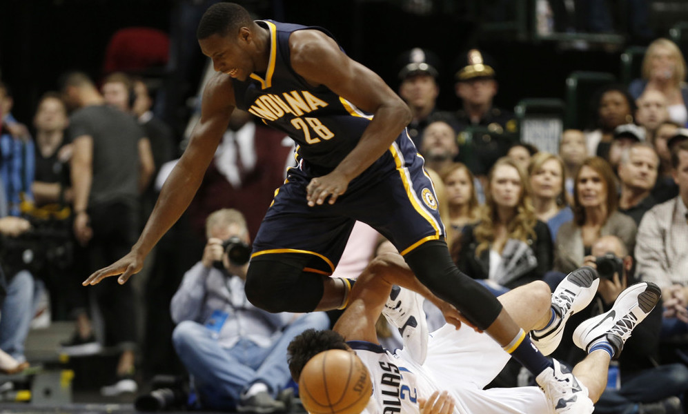 March 12, 2016 - Dallas, TX, USA - The Indiana Pacers' Ian Mahinmi (28) and the Dallas Mavericks' Zaza Pachulia (27) battle for a loose ball during the first half on Saturday, March 12, 2016, at American Airlines Center in Dallas. The Pacers won, 112-105 (Photo by Brandon Wade/Zuma Press/Icon Sportswire)