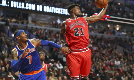 March 23, 2016 - Chicago, Illinois, U.S. - The Chicago Bulls' JIMMY BUTLER (21) grabs a rebound next to the New York Knicks' CARMELO ANTHONY (7) during the second half at the United Center in Chicago on Wednesday. The Knicks won, 115-107 (Photo by Nuccio Dinuzzo/Zuma Press/Icon Sportswire)