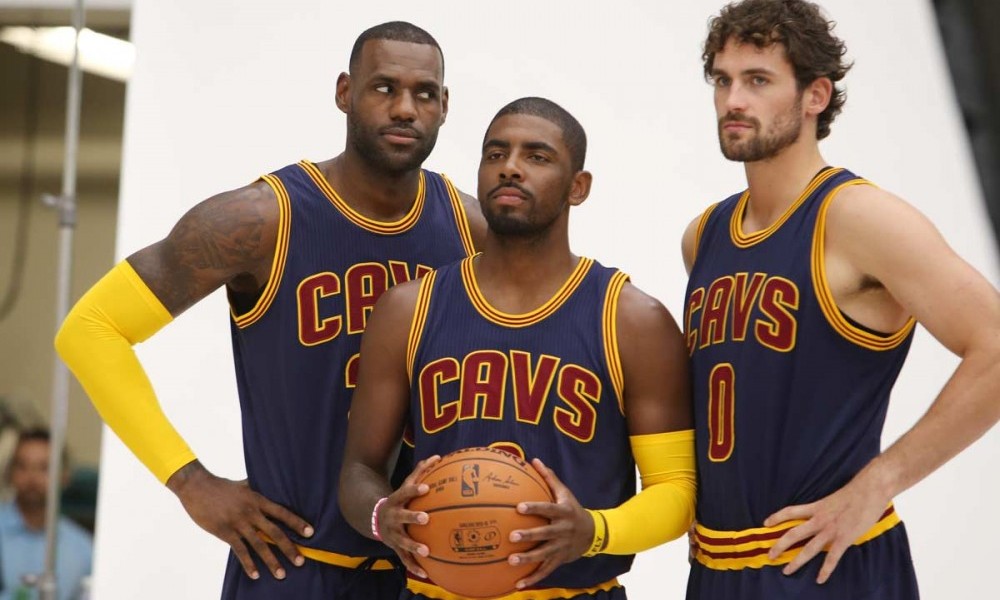 Cleveland Cavaliers' Lebron James, left, Kyrie Irving, center, and Kevin Love pose for a portrait during the NBA team's media day, Monday, Sept. 28, 2015, in Independence, Ohio. (AP Photo/Ron Schwane)