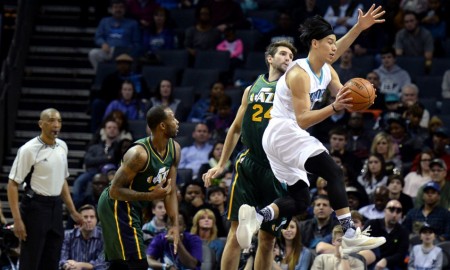 Jan. 18, 2016 - Charlotte, NC, USA - Charlotte Hornets guard Jeremy Lin, right, flies across the lane looking to pass to a teammate as Utah Jazz center Jeff Withey, center, applies defensive pressure during first half action on Monday, Jan. 18, 2016, at Time Warner Cable Arena in Charlotte, N.C (Photo by Jeff Siner/Zuma Press/Icon Sportswire)