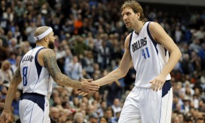 Dallas Mavericks' Deron Williams (8) and Dirk Nowitzki (41) of Germany celebrate a basket in the second half of an NBA basketball game against the Oklahoma City Thunder on Friday, Jan. 22, 2016, in Dallas. The Thunder won 109-106. (AP Photo/Tony Gutierrez)