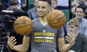 Golden State Warriors guard Stephen Curry (30) looks on during practice before the start of their NBA basketball game against the Utah Jazz Wednesday, March 30, 2016, in Salt Lake City. (AP Photo/Rick Bowmer)