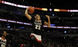 East forward Jayson Tatum, from Chaminade in St. Louis, Mo. dunks against the West team during the McDonald's All-American boys basketball game, Wednesday, March 30, 2016, in Chicago. The West beat the East 114-107. (AP Photo/Matt Marton)