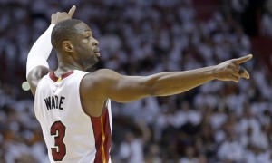 Miami Heat guard Dwyane Wade (3) gives instructions to teammates during Game 7 of a first-round NBA basketball playoff series against the Charlotte Hornets, Sunday, May 1, 2016, in Miami. (AP Photo/Alan Diaz)